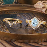 Elegant Pear-Cut Aquamarine Engagement Ring Set